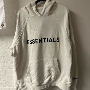 Essentials Cream Pullover Hoodie with Black Logo